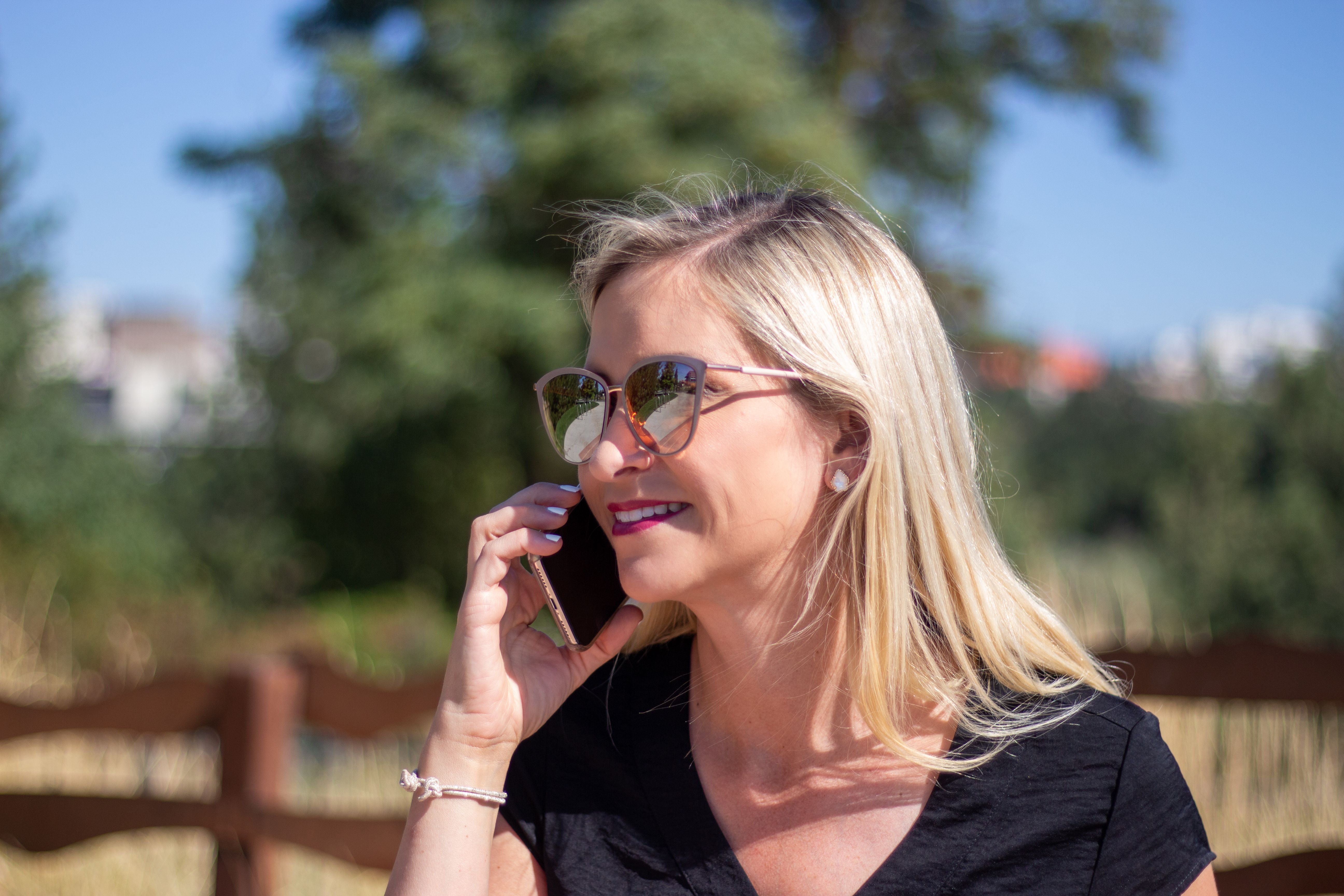 Woman talking on the phone outdoors